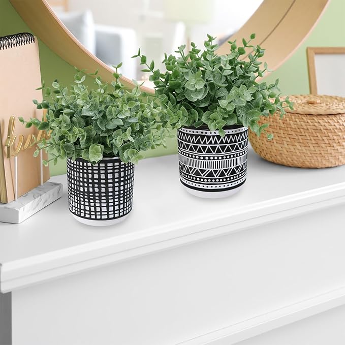 Winlyn Set of 2 Small Potted Plants Artificial Eucalyptus Plant in Black Geometric Ceramic Pots Faux Potted Greenery 7.1" Tall for Desktop Modern Home Office Living Room Kitchen Table Decorations