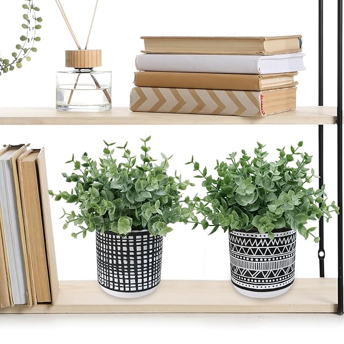 Winlyn Set of 2 Small Potted Plants Artificial Eucalyptus Plant in Black Geometric Ceramic Pots Faux Potted Greenery 7.1" Tall for Desktop Modern Home Office Living Room Kitchen Table Decorations