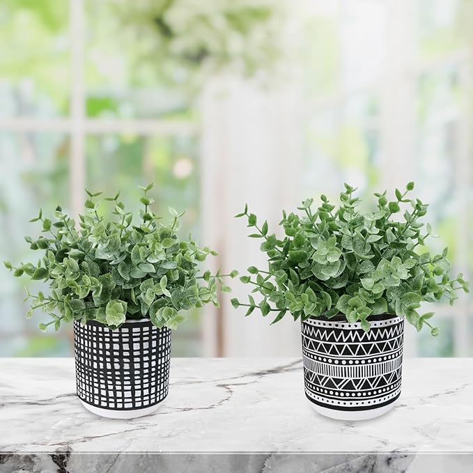 Winlyn Set of 2 Small Potted Plants Artificial Eucalyptus Plant in Black Geometric Ceramic Pots Faux Potted Greenery 7.1" Tall for Desktop Modern Home Office Living Room Kitchen Table Decorations
