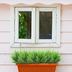 Ouddy Decor 24 Bundles Artificial Plants Outdoors Fake Wheat Grass Faux Greenery Stems Plastic Shrubs UV Resistant for Patio Garden Porch Window Box Spring Home Decor, Green