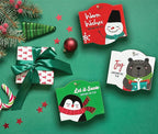 BUZZY Seeds Holiday Mini Spruce Kit 12-Pack – Terracotta Pots with Bear, Penguin, and Snowman Designs, All-in-One Tree Seed Starter Set, Stocking Stuffer, Party Favor