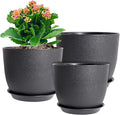 WSMKSZ 10/9/8 inch Medium Plant Pots, 3 Pack Modern Decorative Plastic Planters with Drainage Holes and Saucers, Flower Pots for Indoor Outdoor Plants, Black