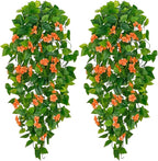 BLEUM CADE Artificial Hanging Flowers for Outdoors, 2pcs Fake Hanging Plants Pothos Vines with Orange Flowers for Wall Home Living Room Indoor Outdoor Fall Decor (No Baskets)