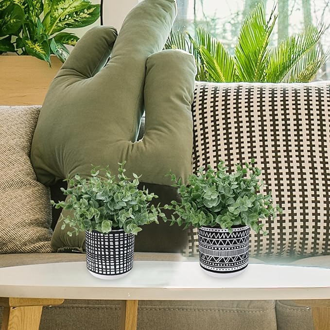 Winlyn Set of 2 Small Potted Plants Artificial Eucalyptus Plant in Black Geometric Ceramic Pots Faux Potted Greenery 7.1" Tall for Desktop Modern Home Office Living Room Kitchen Table Decorations